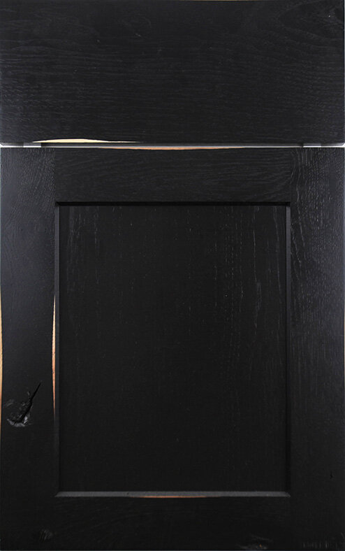a black rub thru kitchen and bath cabinet surface