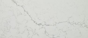 an Alabaster White quartz countertop surface that features long gray veins over the soft white background