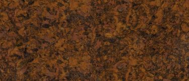 an Aberdeen quartz countertop surface that features colors of gray, green, and oranges blended together with cream white, light gray, and black speckles