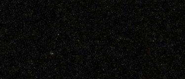 an Absolute Black granite countertop surface that has an intense black color with subtle speck details