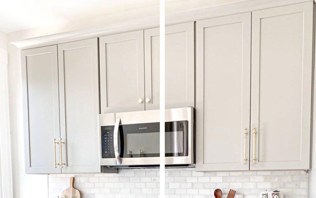 a kitchen cabinet with built-in microwave against the brick tiles backsplash