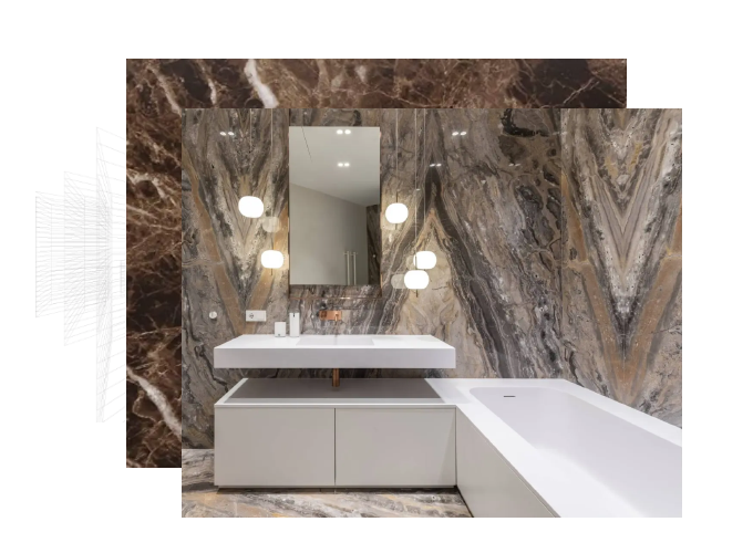 an elegant bathroom with walls and floors in bold marble stone design in brown, a white tub and countertop, and a mirror in between lighting fixtures